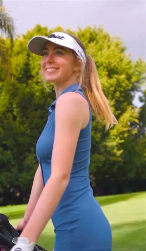 Grace Charis goes golfing in a purple top as she posts slow。